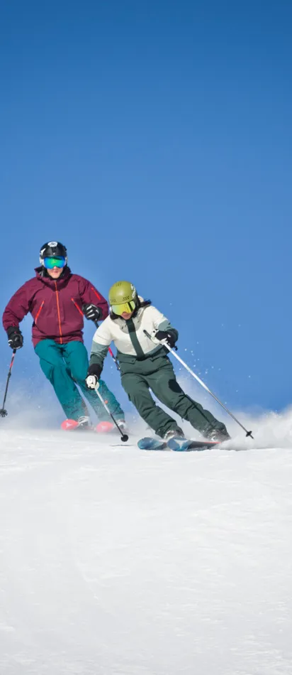 Skiers in Saalbach in the region of Salzburg